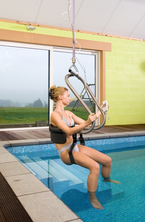 Handi-Move - - Into the pool with the Handi-Move Body Support® and ceiling motor -